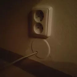 Wall cap with cable cutout