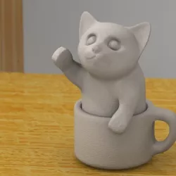 kitten in a cup
