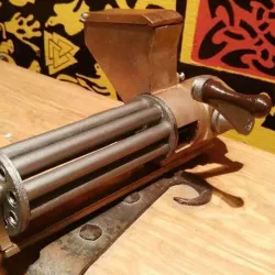 Small rotating, shell ejecting gatling gun