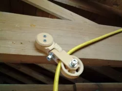 Overhead extension cord pulley