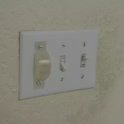 Light switch blocking cover