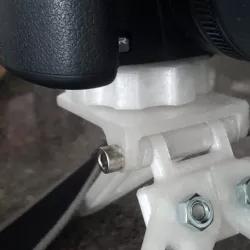 Tripod to camera adjuster knob