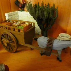 A cart with vegetable and fruit crates