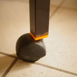 Roll foot cradle / holder for a bird cage or other rectangular tubes