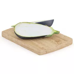 Halved Eggplant on Wooden Board