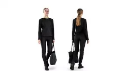 Young woman with bag walking 61