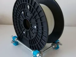 Adjustable size filament spool holder