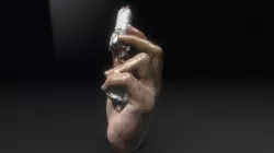 Hand Holding Lipstick