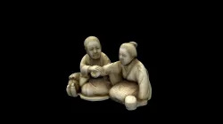 Ivory netsuke in the form of doctor and patient