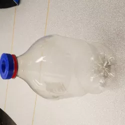 Modified cap for turning two-liter bottle into sharps disposal container