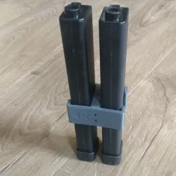 Dual magazine clamp for ARP-9
