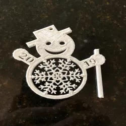 Snowman with snowflake belly