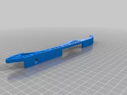 Spring-loaded track tensioner