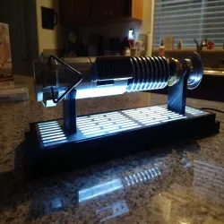 remix of "simple printable lightsaber stand" fit Disneyland Luke Skywalker Saber