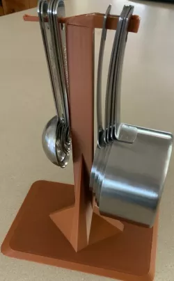 Measuring cup and spoon holder