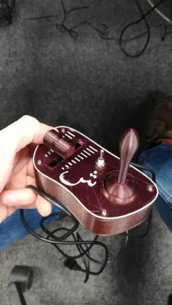 Flight simulator joystick with thrust lever