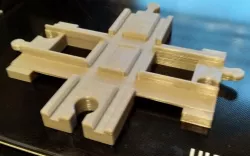 Lego Duplo track crossing with wooden train