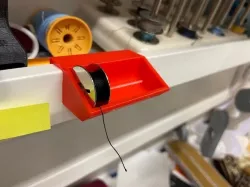 yarn spool holder for IKEA mosslanda shelf
