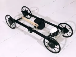 Egg carrying car powered by rubber band