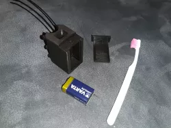 Brush holder and rainproof box for 9V spare battery for pinpoint