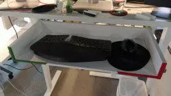 Desk drawer to keyboard tray border