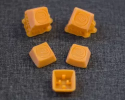 Romer G key cap with OpenSuse logo