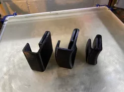 Backpack sling hook keeper