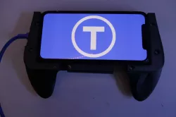 universal mobile gaming grip with charginghole