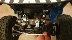 WPL low-profile cast axle servo mount for leaf-spring trucks