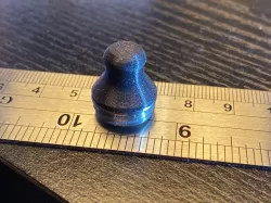 Apple Keyboard battery knob