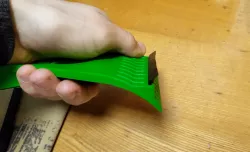 Squeegee for window scraper