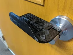 Hands-free door handle opener