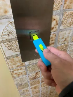 Retractable Button Pusher