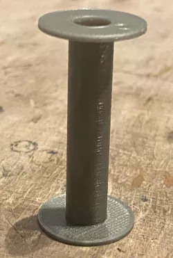Spool for machine sewing.