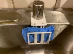 Sponge holder with dishwasher airgap mount