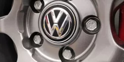 Center-cap adapter to fit OEM VW caps on Enkei wheels