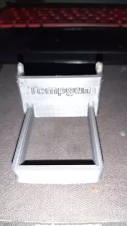 Temperature gun holster for pegboard