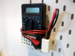 Parametric universal pegboard hook multimeter support 