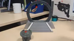 Stargate in an off-world pedestal with a DHD
