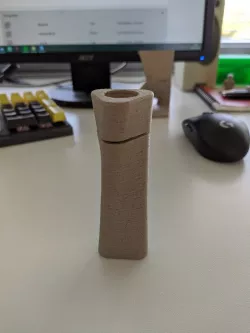 Bone shaped pill container with half pill lid