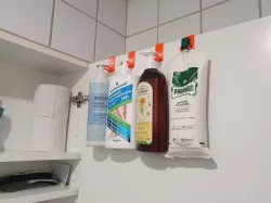 Bathroom cabinet door - hook/holder