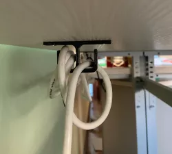 Under table wire holders