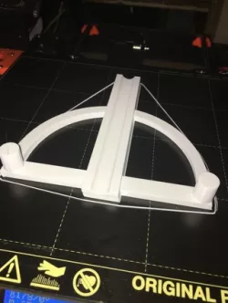 elastic powered pellet slinger
