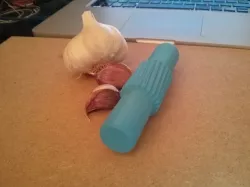 Garlic press roller