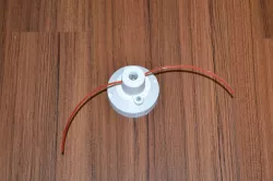 Head for nylon trimmer line
