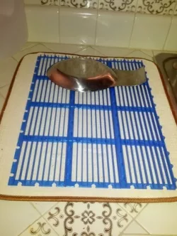 Interlocking grate tiles