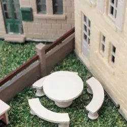 Garden table with concrete benches