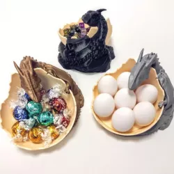 Dragon guarding egg, candy or dice.