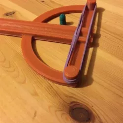 elastic powered pellet slinger