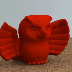 Owl with wings spread